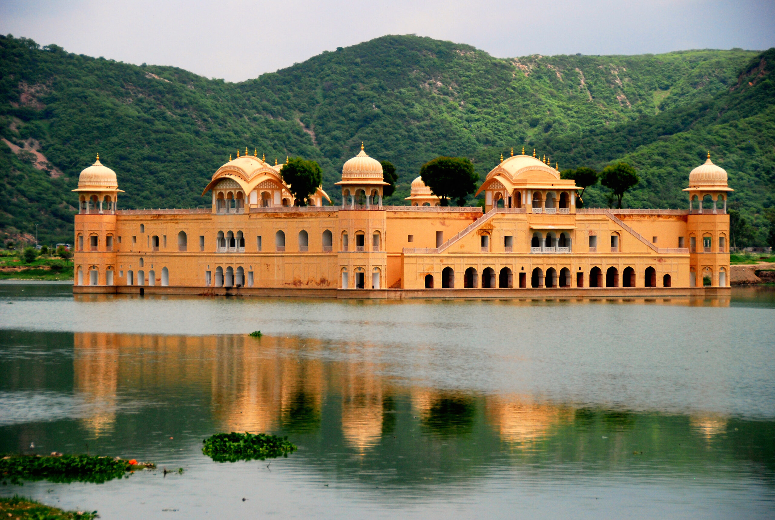 Jal Mahal Water Palace in Jaipur situated in the middle of Man Sagar Lake with hills in the background
