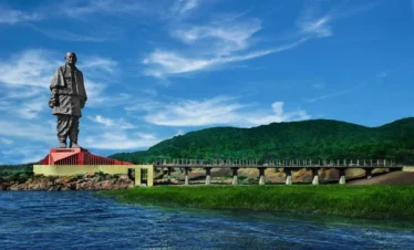 Statue of Unity in Kevadia, Gujarat, towering over the Narmada River with scenic surroundings